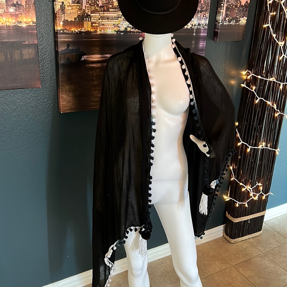 Black swimsuit cover up by Echo